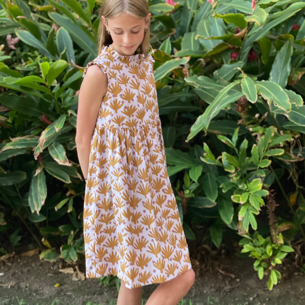 Find me in Ibiza dress is perfect for your kid's wardrobe. Featuring cute ruffle sleeves and made from 100% cotton fabric, this dress provides comfort and durability. With a high-quality construction and attention to detail, you can rest assured that your child will look and feel amazing.  Made for play or the ballet these made-in-Utah dresses are small batch, high quality and made to be passed on to generations to come.