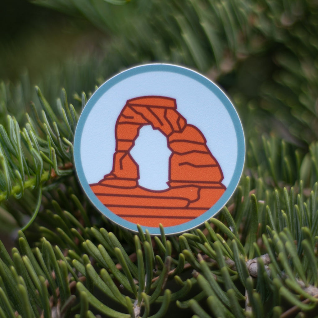 We love Delicate Arch and felt we needed to make a simple, clean design to pay it homage. Size Sticker is 2" x 2" Blue background.
