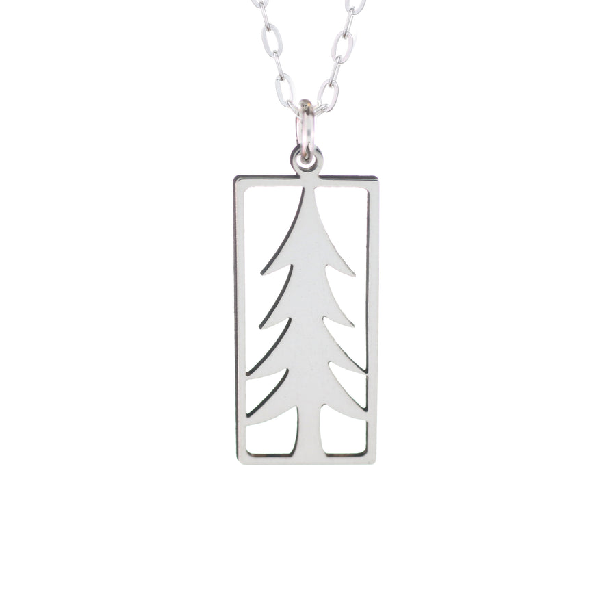A dainty sterling silver cut-out necklace displaying a spruce tree.