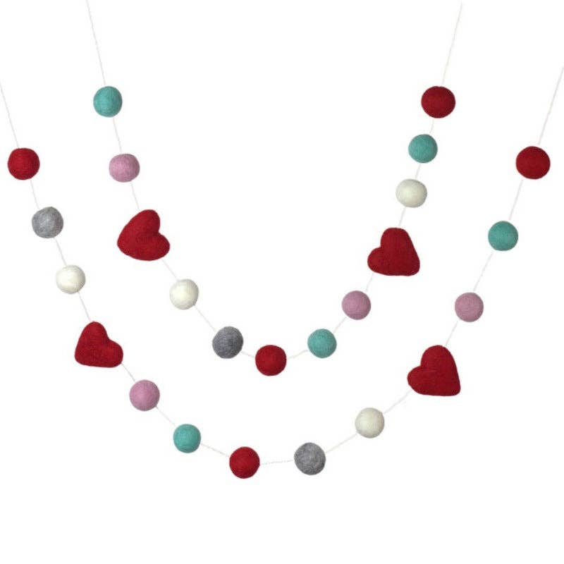 Felt balls measure 1". Hearts measure approx. 1.75". Garland is a 6 ft string with 21 balls + 4 red hearts. Felt shapes are moveable. Once in place, shapes will not move on their own. Garland comes as one single strand. Pink, Grey & white, RED, & blue felt balls.