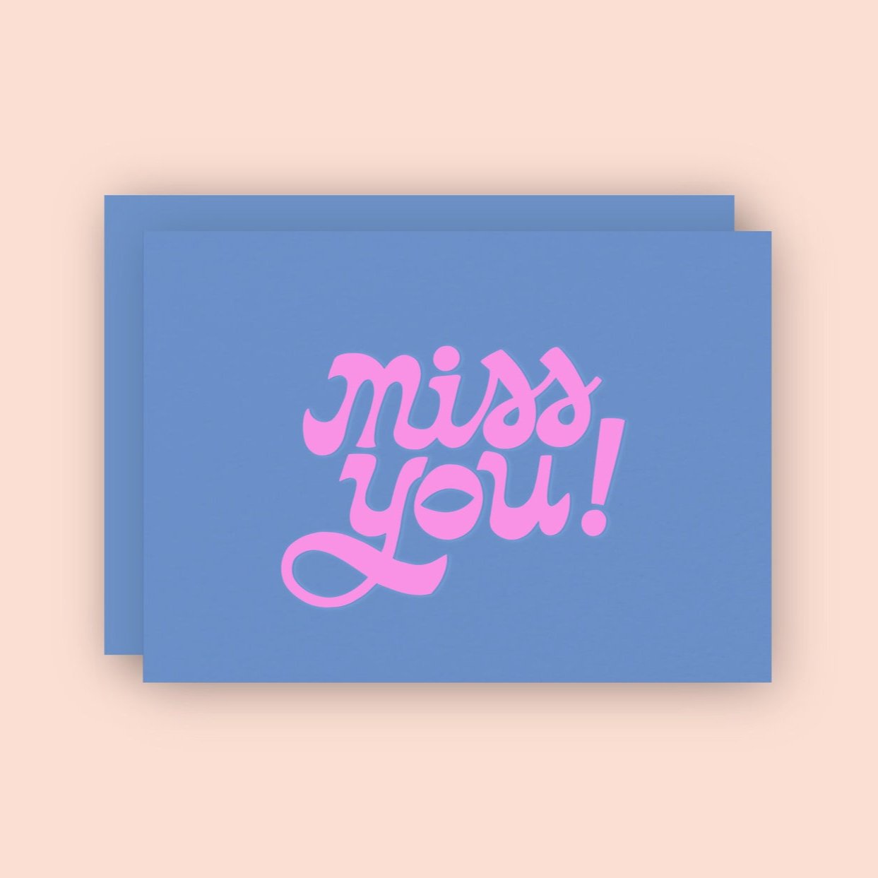 blue greeting card with pink 'Miss You!"