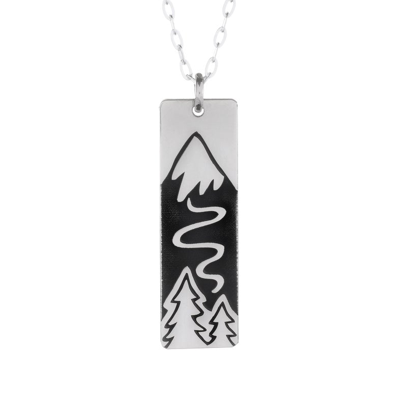 Solid Sterling Silver pendant. Polished finish on the front. Satin finish on the back. Solid Sterling Silver chain.