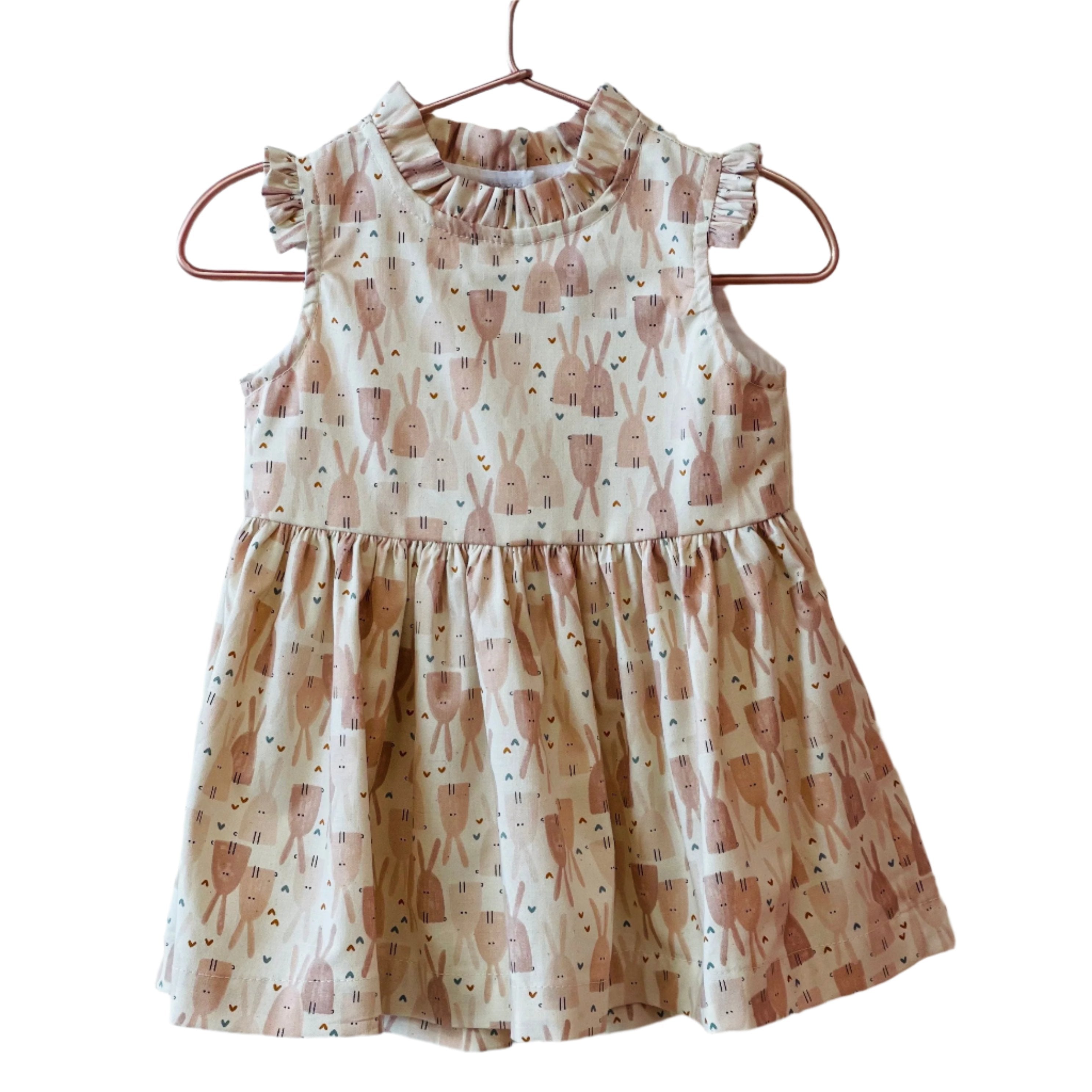 The Lily dress is perfect for your kid's wardrobe. Featuring cute ruffle sleeves and made from 100% cotton fabric, this dress provides comfort and durability. With a high-quality construction and attention to detail, you can rest assured that your child will look and feel amazing.